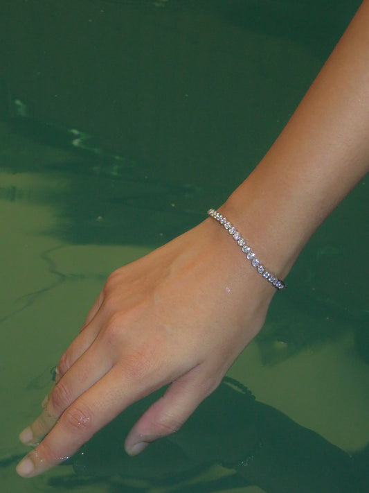 THE INVISIBLE-SET ROUND-CUT TENNIS BRACELET